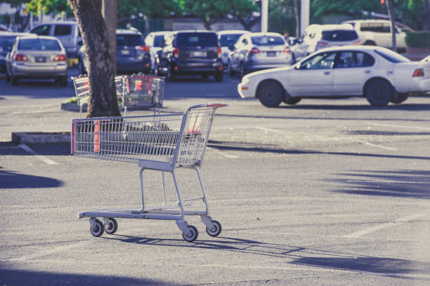 istock Empty shopping trolley in a car park 654184544