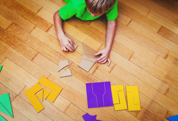 istock little boy playing with puzzle, early education 654184952