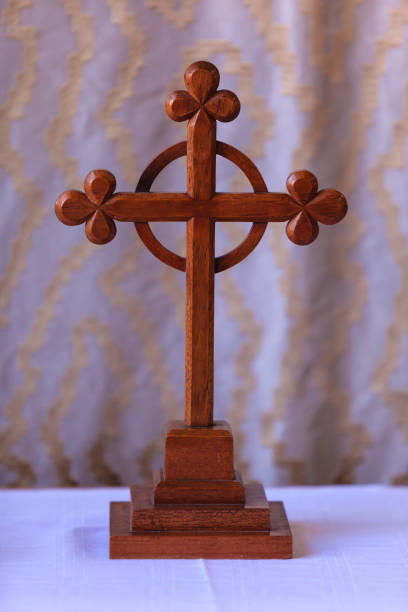 istock Old cross in church, Bibury England 654187104