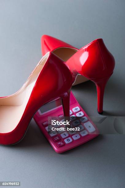 Calculator Of The Pink And Red High Heels Stock Photo - Download Image Now - Calculator, Copy Space, High Heels