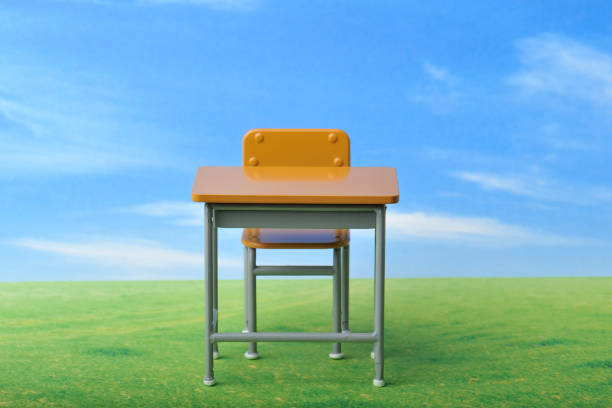 istock Miniature school desk and Chair 654197270
