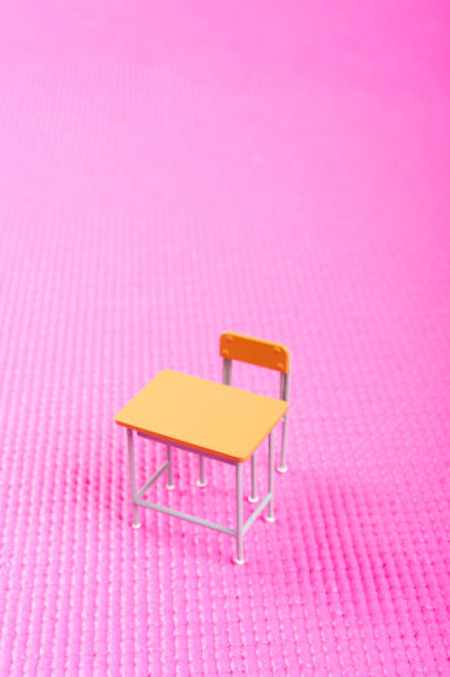 istock Miniature school desk and Chair 654197330
