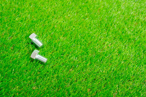 Screw the metal on the lawn
