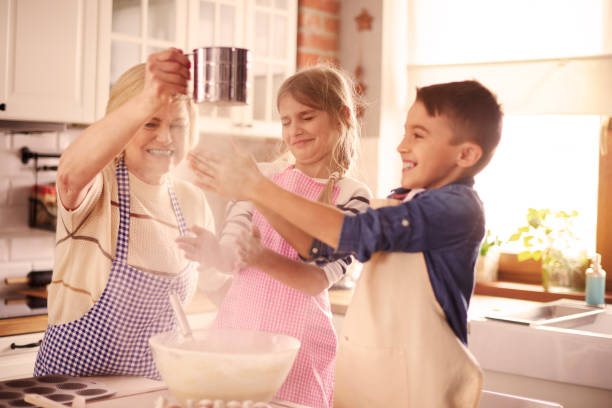istock Playful kids having fun with the flour 654203616