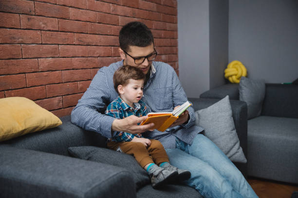 istock Father and son at home 654206446