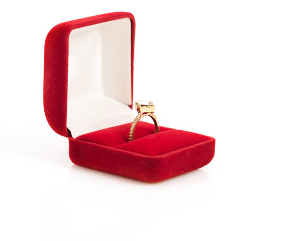 istock wedding rings in a gift box on white background 654213010