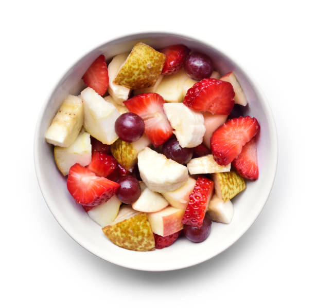 frutas en un tazón de fuente blanco - tazón para frutas fotografías e imágenes de stock