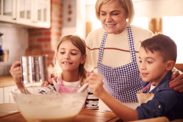 istock Close up of three chefs cooking 654216326