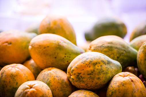 Papaya for sale on farmers' market, Oahu, Hawaii, USA