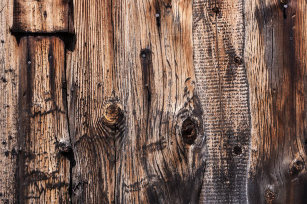 istock Wooden background from old weathered planks. 654234990