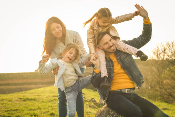istock Happy family in the park. 654238534