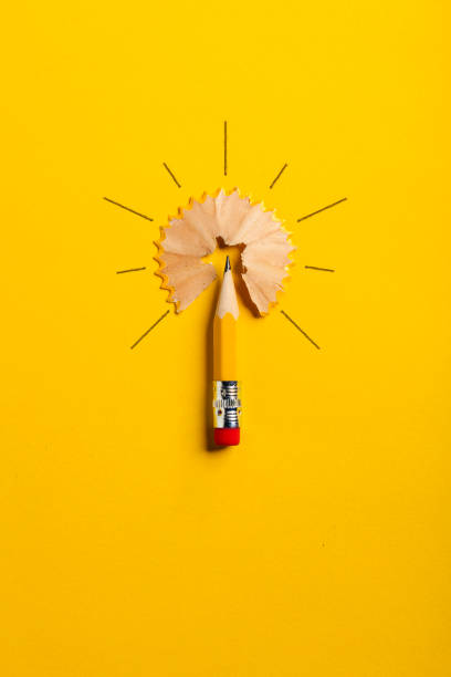 Pencil Light Bulb Photography of a pencil on yellow paper arranged to a light bulb. education concept stock pictures, royalty-free photos & images