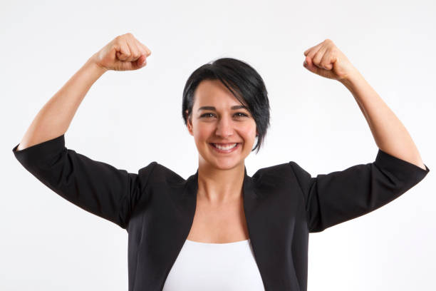 istock Businesswoman Flexing Muscles 654239378