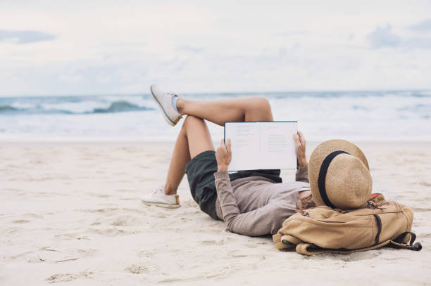 istock Girl resting on a beach 654248144