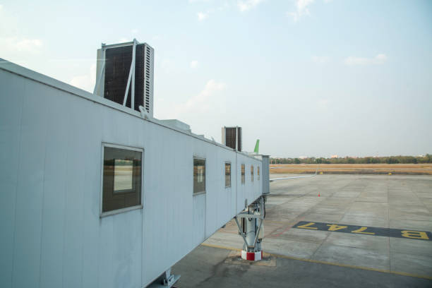 istock Bridge for connect the airplane at airport. 654253578