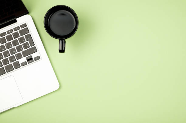 istock Creative design mockup set of workspace desk with cup of coffee and notebook 654258416