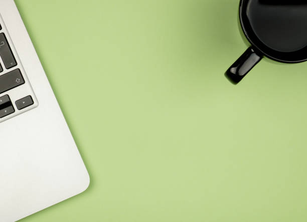 istock Creative design mockup set of workspace desk with cup of coffee and notebook 654258432