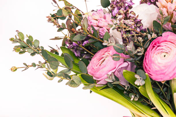 istock Ranunkulyus bouquet of red flowers on a white background 654259714
