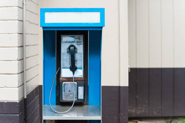 Old telephone box Old telephone box blue pay phone stock pictures, royalty-free photos & images