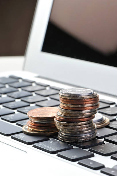 istock Keyboard and Japan Yen coins 654275600