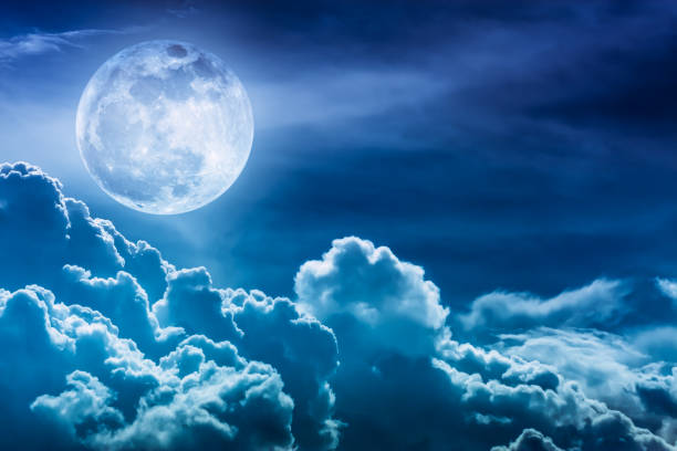 istock Super moon. Sky with clouds and full moon. 654275792