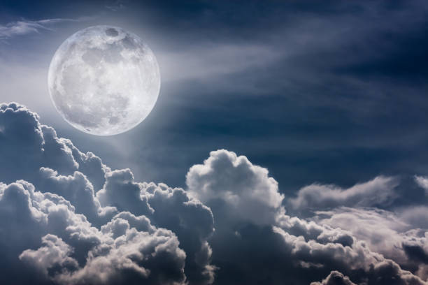 istock Nighttime sky with clouds and full moon. Vintage tone effect. 654279764
