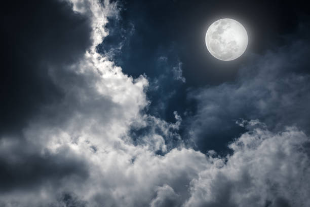istock Nighttime sky with clouds and full moon. Vintage tone effect. 654279952