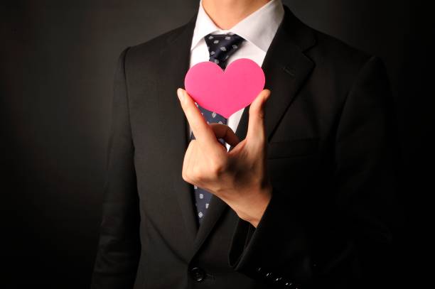 istock Young staff have a pink heart 654287920