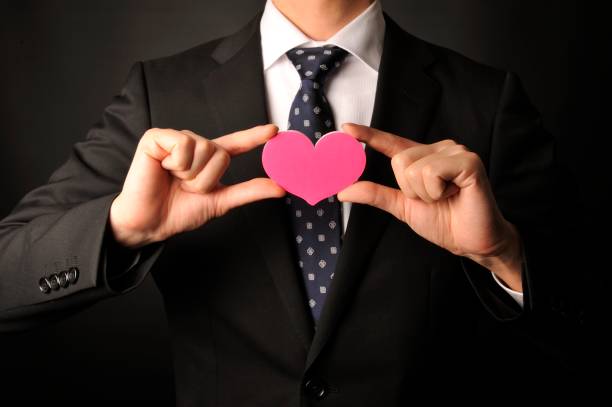 istock Young staff have a pink heart 654287930
