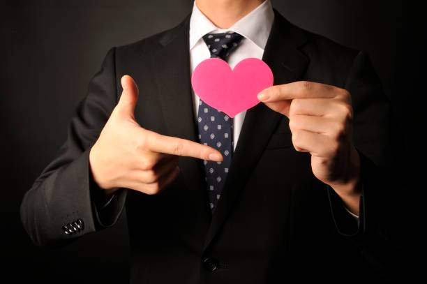 istock Young staff have a pink heart 654287950