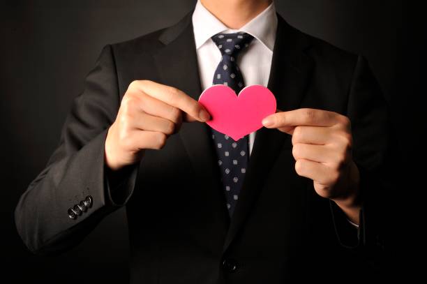 istock Young staff have a pink heart 654287956