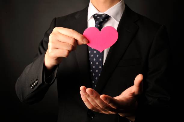 istock Young staff have a pink heart 654287986