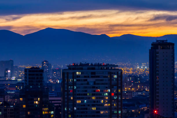 The view of city against sunset, Santiago