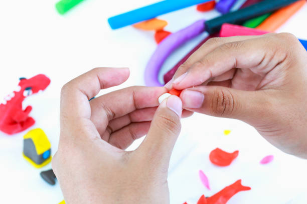 istock Child molding model clay. Strengthen the imagination. 654298050