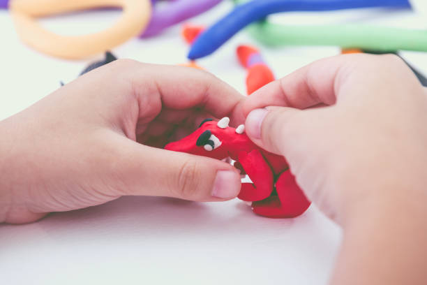 istock Child molding model clay. Strengthen the imagination. 654298106