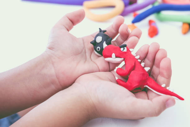 istock Child molding model clay. Strengthen the imagination. 654298214