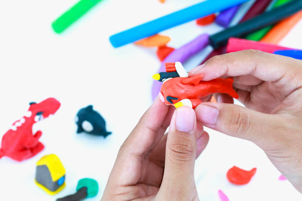 istock Child molding model clay. Strengthen the imagination. 654298282