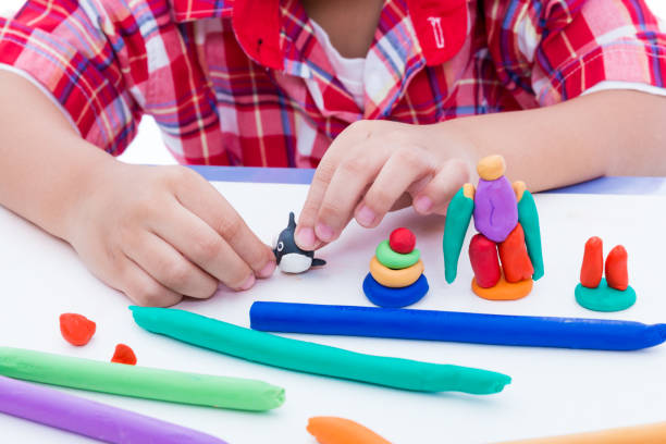 istock Child molding model clay. Strengthen the imagination. 654298380