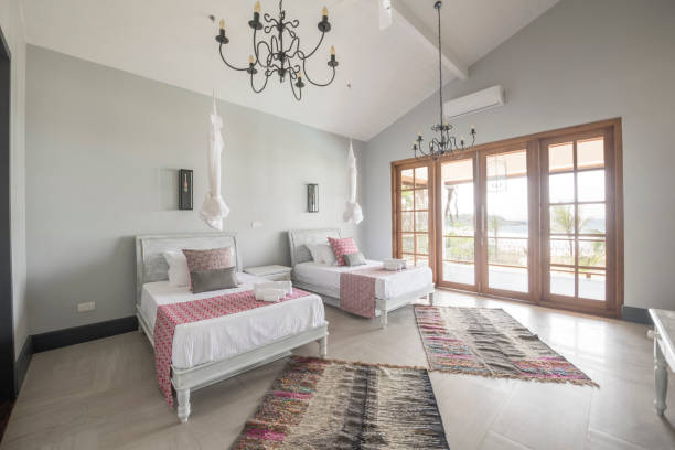Twin beds in contemporary apartment room