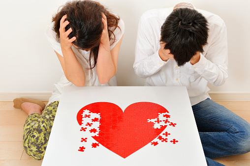 Red heart puzzle making Japanese men and women