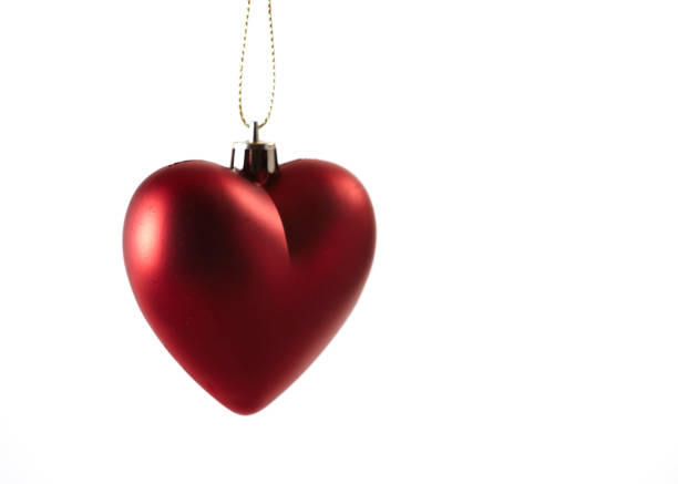istock Red Heart Christmas Decoration on White 654313976
