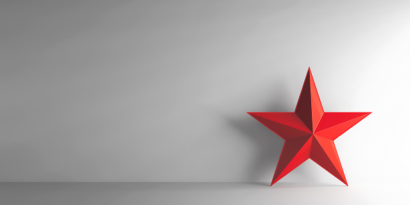 Red star on grey background, three-dimensional rendering, 3D illustration