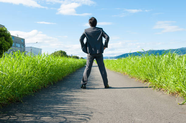 istock One way to go Japanese businessman 654327524