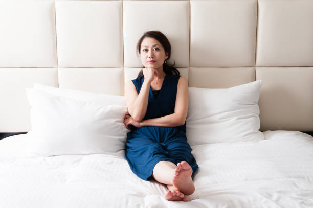 istock Japanese women to relax in bed 654328026