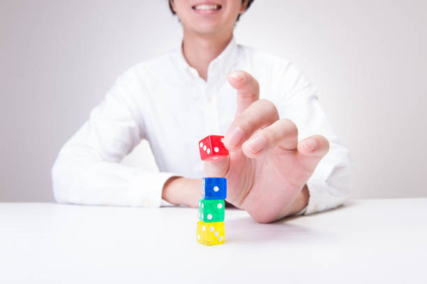 The dice in female hand close up.