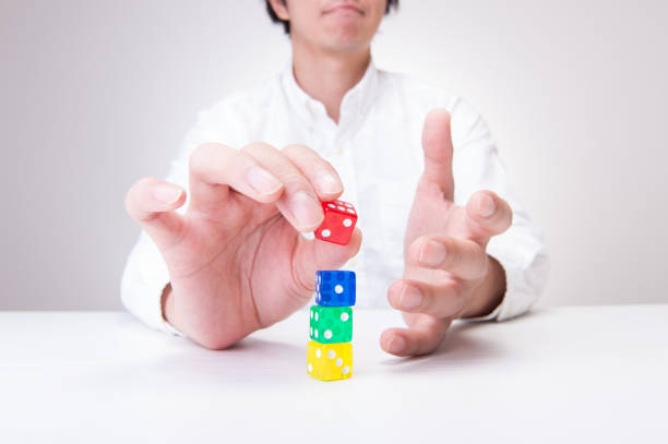 Japanese men with colorful dice hand