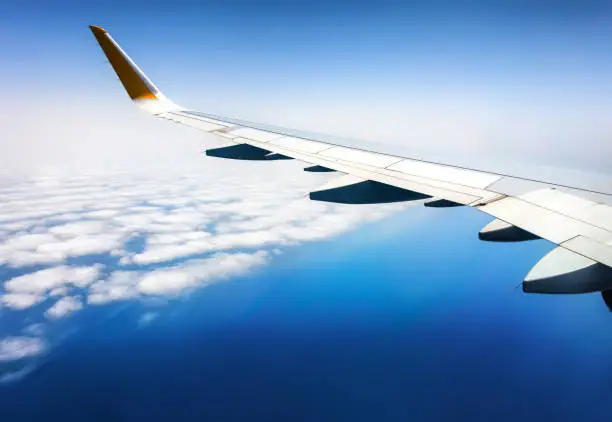 Photo of fly airplane avion window wing sea