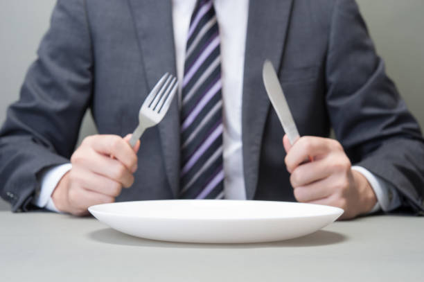 istock Japanese have a knife and fork in hand 654332578