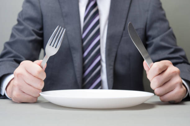 istock Japanese have a knife and fork in hand 654332606