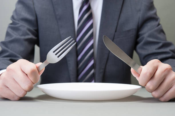 istock Japanese have a knife and fork in hand 654332612